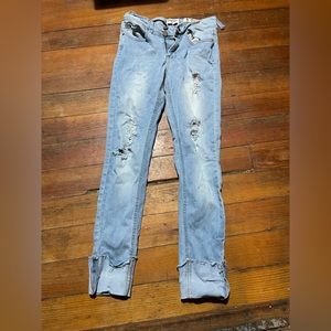 Size 5 ankle jeans with holes and two belt loops broken
